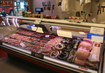 Inside Swansea shop picture, showing various meats