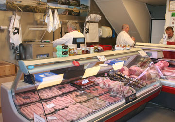 Inside Swansea shop picture, showing various meats